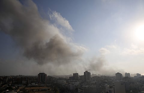 Smoke and fire from an Israeli strike rise over Gaza City. (Photo | AP)