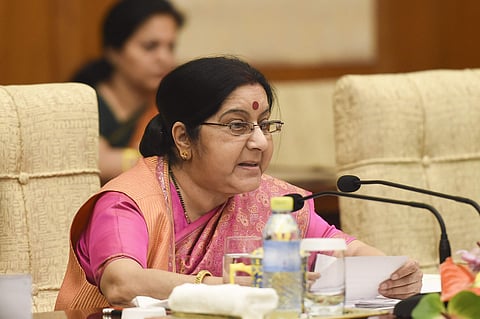 The row over the micro blogging messages attacking Ms Swaraj took a new turn when one missive in the micro blogging site had gone to the extent of urging her husband Swaraj Kaushal, a former Mizoram Governor, to 'beat her up' to stop Muslim appeasement. (