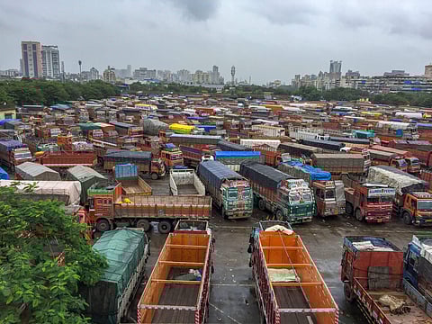 Trucks parked at APMC truck terminal following a strike called by the transporters in Navi Mumbai on Friday. (Photo | PTI)