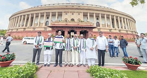 YSRC leaders stage a protest demanding SCS to AP at Parliament House in New Delhi on Thursday | PTI