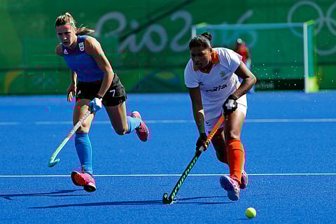 India's Namita Toppo, right, takes the ball as she is chased by Argentina's Martina Cavallero during a women's field hockey match at the 2016 Summer Olympics in Rio de Janeiro, Brazil.(File | AP)