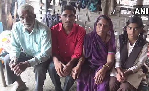 18-year-old Asharam Choudhary with his family. (Photo | ANI)