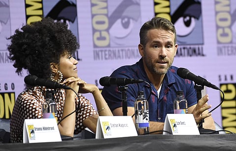 Ryan Reynolds, right, speaks as Zazie Beetz looks on at the 'Deadpool 2' panel on day three of Comic-Con International on Saturday, July 21, 2018, in San Diego. | AP
