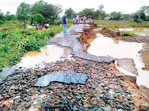 The remains of the road near Jaipatna after Hati river swept it away I UMA SHANKAR KAR
