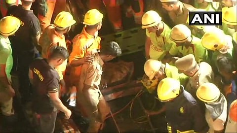 Fire and safety personnel involved in rescue operations at the Kandanchavadi building collapse site. (Photo : Twitter/ANI)