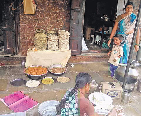 Rotti Mahadevi (right) overlooks rotti preparation at Veerabhadreshwara Food Supplies at Shivaji Nagar in Kalaburagi