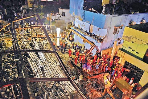NDMA rescue team at the construction site after the accident on MGR Road in Taramani | Martin Louis
