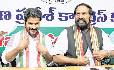 Congress leaders Uttam Kumar Reddy and Revanth Reddy getting ready to address the press conference, in Hyderabad on Saturday | Sathya Keerthi