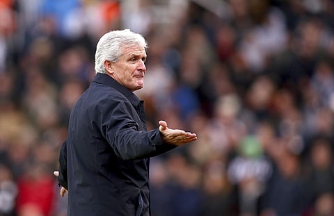 Stoke City manager Mark Hughes gestures on the touchline during the match against Newcastle United, during their English Premier League soccer match at the bet365 Stadium in Stoke. | AP