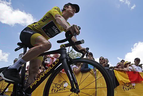Britain's Geraint Thomas, wearing the overall leader's yellow jersey, arrives for the start of the fifteenth stage of the Tour de France. (Photo | AP)