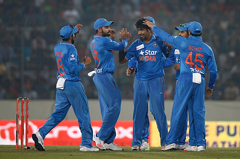 India’s Jasprit Bumrah, center, celebrates with his teammates after the dismissal of Bangladesh’s Soumya Sarkar during the Asia Cup | File AP