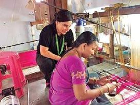 Aparna Challu observes a craftswoman at work
