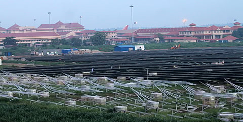 Solar panels set up on the premises of Cochin International Airport, Nedumbassery, as part of a solar-powered airport project being implemented at the facility. ( Express Photo service | Kaviyoor Santhosh)