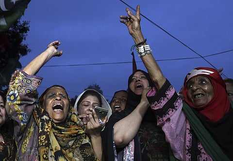 People celebrate on the day of Pakistan Elections. (Photo | AP)