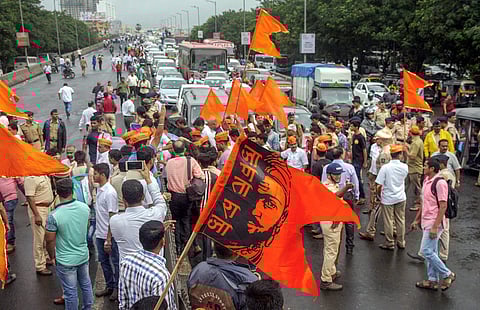 Maratha Kranti Morcha activists stop the traffic during their statewide bandh called for reservations in jobs and education at Thane in Mumbai on Wednesday July 25 2018. | PTI