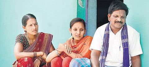 M Sumithra, along with her parents, at her home | S DINESH