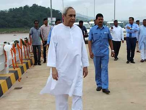 Chief Minister Naveen Patnaik moving on Gurupriya bridge after its inauguration on Thursday. (EPS)