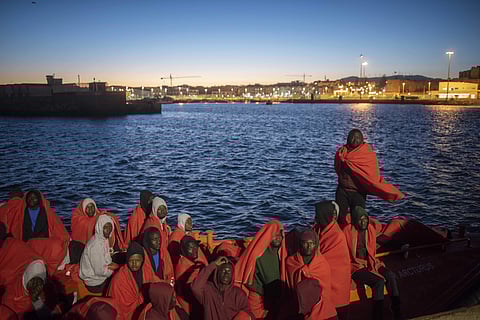 Migrants rest onboard Spain's Arcturus Maritime Rescue Service boat at the port of Tarifa. (Photo | AP)
