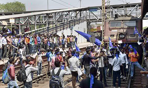In this file image, Dalit community members stop a train at Gaya railway station during 'Bharat Bandh' call given by Dalit organisations against the alleged 'dilution' of the Scheduled Castes/Scheduled Tribes act in Gaya | PTI