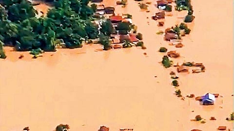 This screen grab taken on handout video footage from ABC Laos on Tuesday shows an aerial view of the flooded plains in Attapeu province after a dam collapsed the day before | AFP