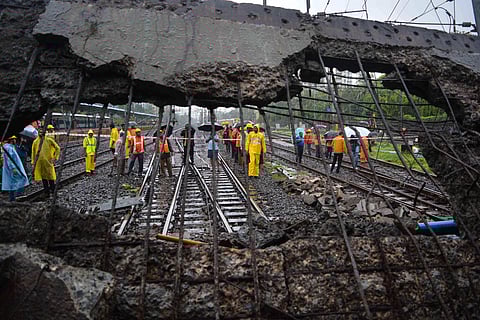 Train services of the Western Railway in Mumbai came to a halt after a part of a footover bridge (FOB) collapsed this morning. (Photo | PTI)