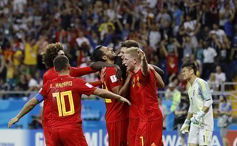 Belgium's Nacer Chadli, center celebrates with teammates after scoring his third side's goal during the round of 16 match between Belgium and Japan at the 2018 soccer World Cup in the Rostov Arena. | AP