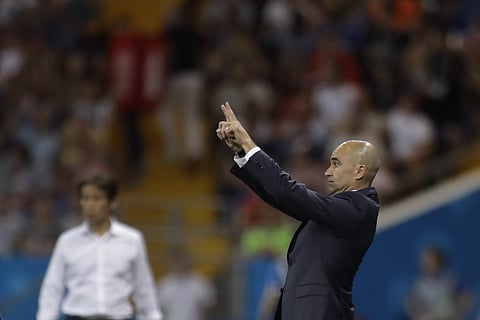 Belgium coach Roberto Martinez gives instructions from the side line during the round of 16 match between Belgium and Japan. (AP)