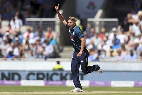 England's Sam Curran celebrates taking the wicket of Australia's Ashton Agar, during the One Day International match between England and Australia, at Emirates Old Trafford, in Manchester, England, June 24, 2018. (Photo | AP)