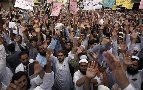 Supporters of different political parties demonstrate to reject the election results in Peshawar, Pakistan. (Photo | AP)