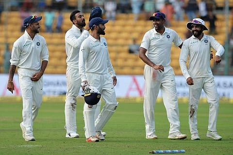 Indian cricketers walk back after their victory on the second day of one-off India Vs Afghanistan Test match at The M. Chinnaswamy Stadium in Bangalore on June 15, 2018. | (File | AFP)