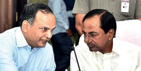 Chief Minister K Chandrasekhar Rao interacts with chief secretary SK Joshi at a conference with district collectors, in Hyderabad. (File Photo | EPS)