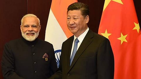 Indian PM Narendra Modi meets President of China XiJinping on margins of SCO Summit in Astana. (Photo: Twitter via @MEAIndia)