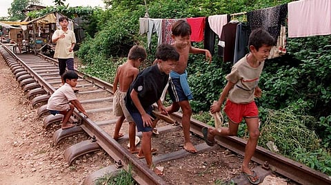 Children play on unused railway line in Phnom Penh, Cambodia. A missing 48km stretch of railway that connects the capital Phnom Penh to the Thai border has been rebuilt, 45 years after it was destroyed. (Photo | AP)