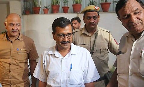 Delhi CM Arvind Kejriwal and Deputy CM Manish Sisodia arrives to meet his Lawyer P. Chidambaram at his residence in New Delhi on Wednesday. (EPS |Shekhar Yadav)