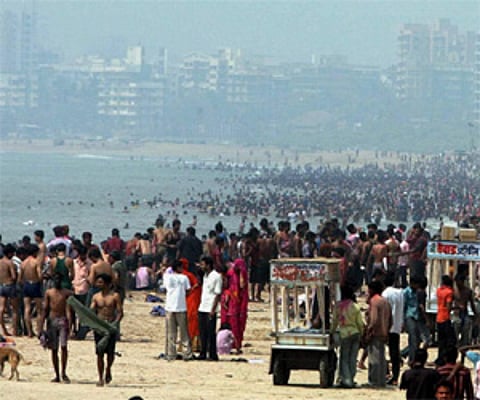 People enjoy holidays at Juhu beach. (File Photo)