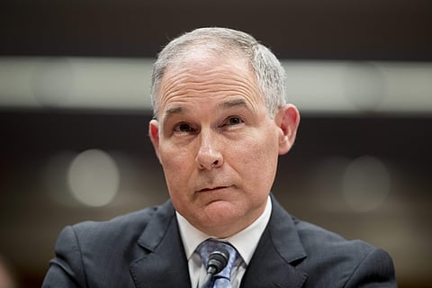 In this May 16, 2018, file photo, Environmental Protection Agency Administrator Scott Pruitt appears before a Senate Appropriations subcommittee on the Interior, Environment, and Related Agencies on budget on Capitol Hill in Washington. President Trump tw