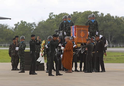 The body of Saman Gunan, a former Thai navy SEAL who died during an overnight mission, is carried during a repatriation and religious rites ceremony at Chiang Rai Airport in Mae Sai, Chiang Rai province, in northern Thailand Friday, July 6, 2018. The Thai