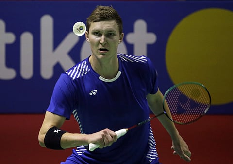 Denmark's Viktor Axelsen plays against China's Shi Yuqi in their men's singles semi final match during the Indonesia Open badminton championship in Jakarta. | AP