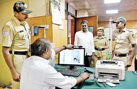 Apparatus set up at the reception of Lokayukta office to generate photo-IDs | Vinod Kumar T