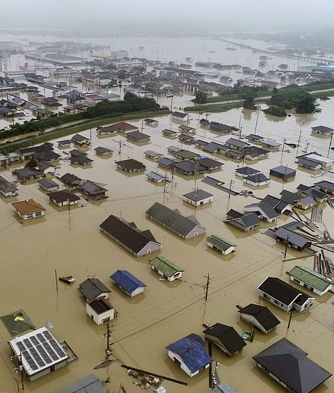 Residential areas are flooded in Kurashiki, Okayama prefecture.(Photo | AP)