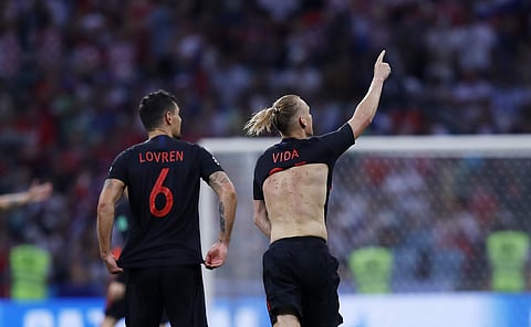 Croatia's Domagoj Vida, right, celebrates after scoring his side's second goal during the quarterfinal match between Russia and Croatia. (Photo | AP)