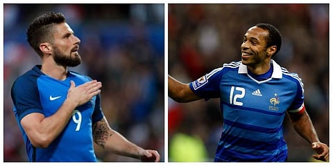 France striker Oliver Giroud (L) and Thierry Henry | AP Images