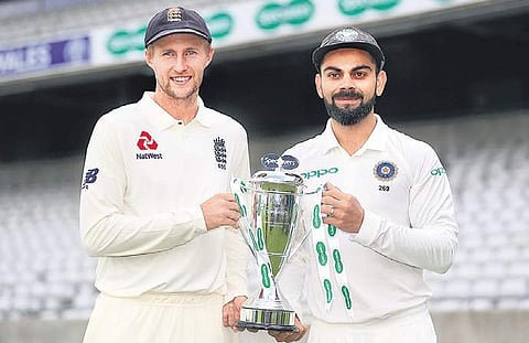 England captain Joe Root (left) and India captain Virat Kohli with the Specsavers Trophy ahead of the Test series on Tuesday | PTI