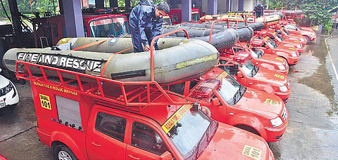 Fire and Rescue Services personnel preparing scuba vans which have been kept on stand for emergency rescue operation, in Kochi on Tuesday| Albin Mathew