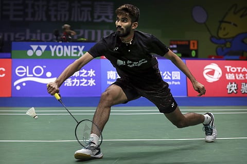 Kidambi Srikanth of India plays a shot while competing against Pablo Abian of Spain during their men's badminton singles match at the BWF World Championships in Nanjing. | AP