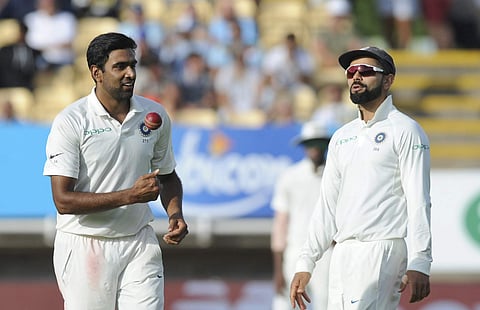 Indian cricket captain Virat Kohli, right, speaks to bowler Ravichandran Ashwin during the first day of the first test cricket match between England and India at Edgbaston in Birmingham. (Photo | AP)