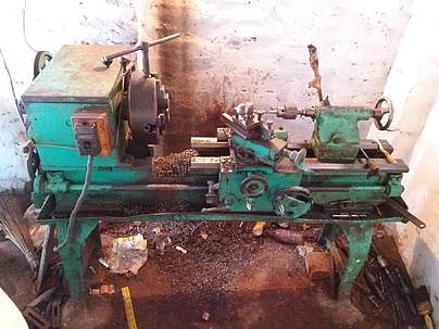 A gun-making lathe machine and semi-finished pistols recovered from the illegal arms factory at Jagatdal in North 24 Parganas district of West Bengal on Tuesday. (Photo | EPS)