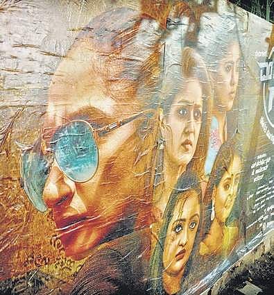 Film posters pasted on a compound wall in Shivajinagar | Shriram BN