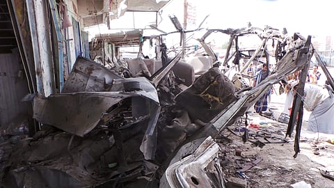 The wreckage of a bus remains at the site of an airstrike in Saada, Yemen. (Photo | AP)