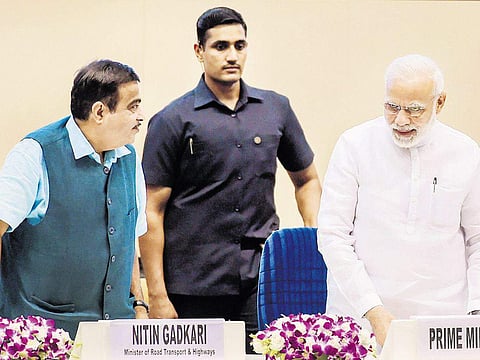 Prime Minister Narendra Modi with Union Minister Nitin Gadkari at the World BioFuel Day event in New Delhi on Friday | PTI